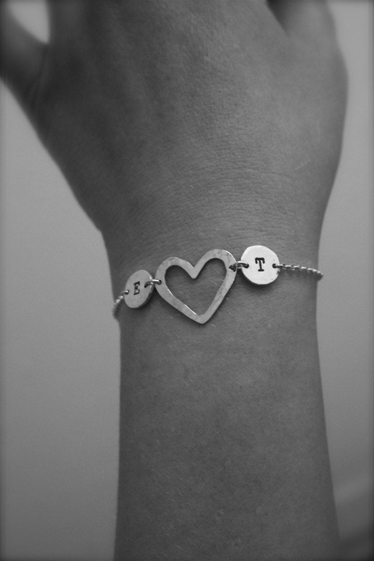 "Lovely personalised two initial bracelet with a heart. It is made from sterling silver. Simple and adorable, personalised bracelet perfect for everyday, for any outfit. Lovely present for Christmas, wedding, bridal shower, anniversary , keepsake, graduation, mother's day or just treat yourself! Please leave the initials wanted at the checkout \"Notes to Seller\" Thank you for looking and choosing hand made. Kind regards, Edite CANCELLATIONS, REFUNDS ETC: All items are sent made to the specifica Personalised Bracelet, Present For Christmas, Custom Jewellery, Medical Bracelet, Bracelet Heart, Letter Ring, Sterling Silver Initial, Love Bracelet, Heart Stamp