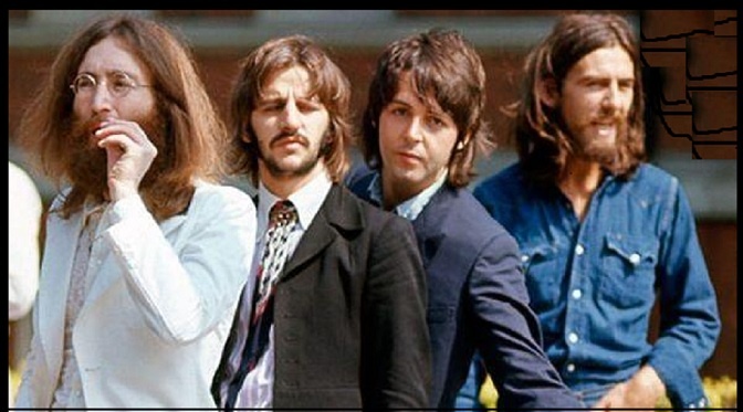 the beatles are posing for a photo in front of a building with long hair and beards