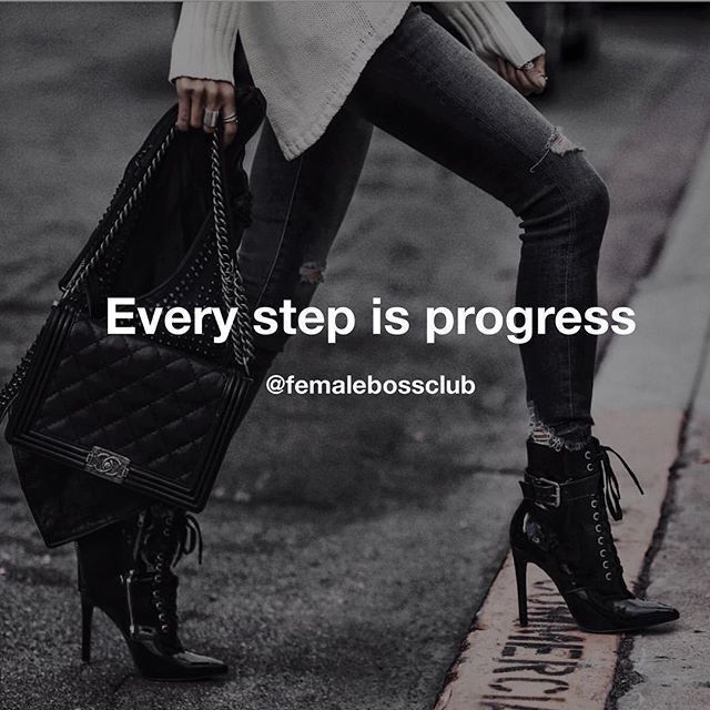 a woman walking down the street carrying a black purse and high heeled boots with text that reads, every step is progress