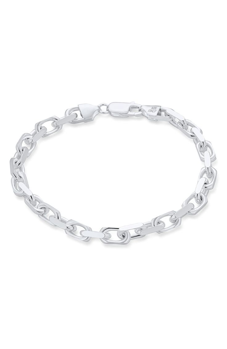 Instantly elevate any ensemble with this polished chain bracelet with flat and round edges for added intrigue. Lobster-clasp closure Sterling silver Imported Modern Bracelets With Solid Chain Link Construction, Modern Solid Link Chain Bracelet, Modern Solid Chain Link Bracelet, Modern White Gold Jubilee Charm Bracelet, Modern Jubilee Link Bracelet, Modern Bracelets With Box Chain And Chain Link, Silver Paperclip Bracelet With Rectangular Links For Formal Occasions, Modern Silver Charm Bracelet With Rectangular Links, Silver Paperclip Bracelet With Oval Links For Formal Occasions