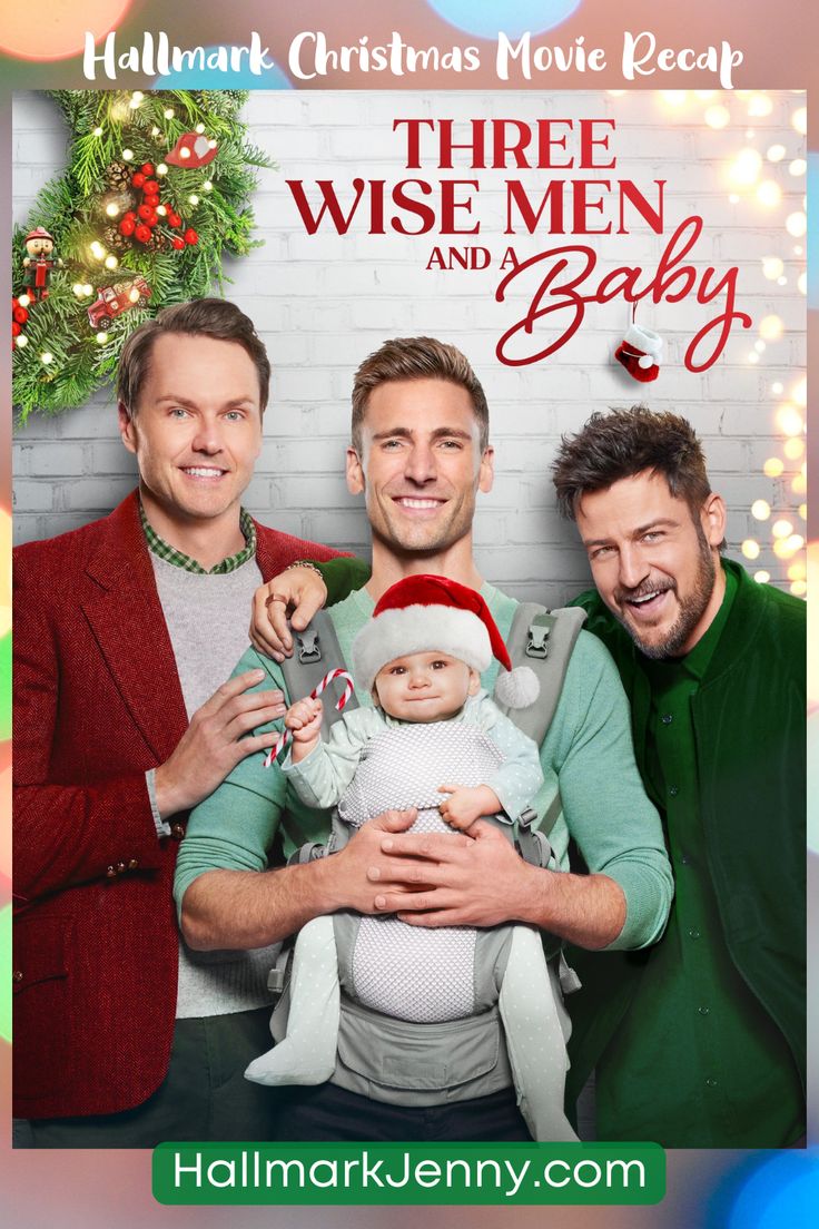 three wise men and a baby are posing for a christmas photo with a wreath in the background