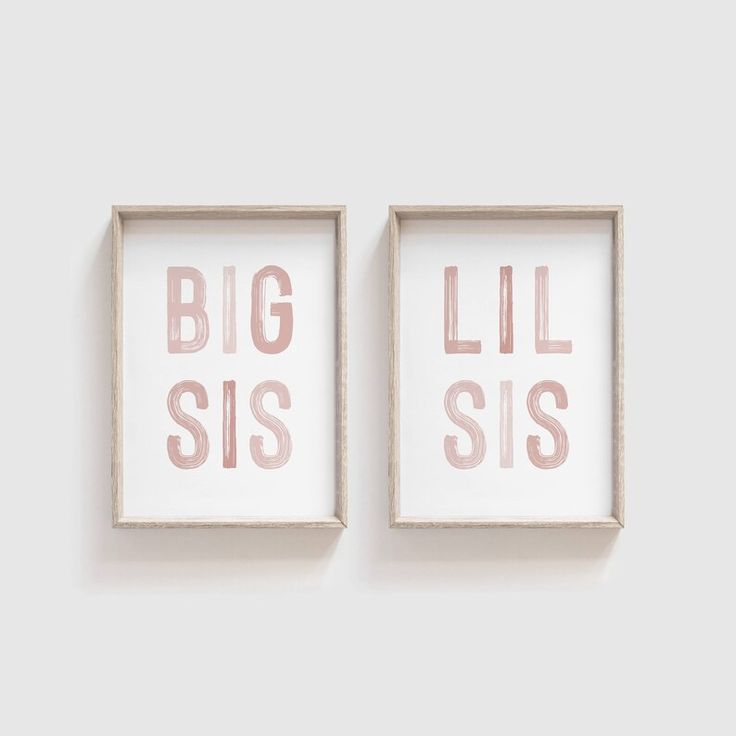 two framed art pieces with the words big sis and little sis in pink on them