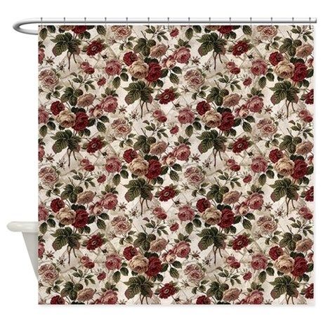 a red and white wallpaper with roses on the border, in front of a maroon background