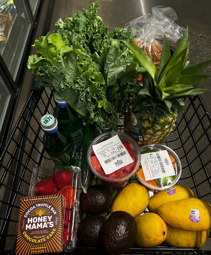 a shopping cart filled with fruits and vegetables