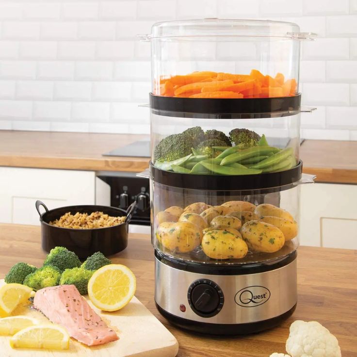 the food is being prepared in the slow cooker on the kitchen counter with vegetables and meat