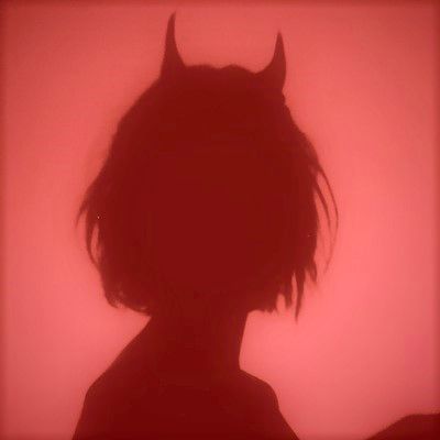 the silhouette of a woman with horns on her head