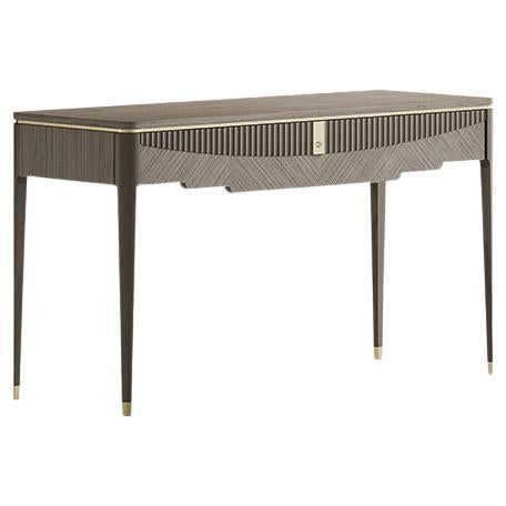 an art deco console table in grey and gold