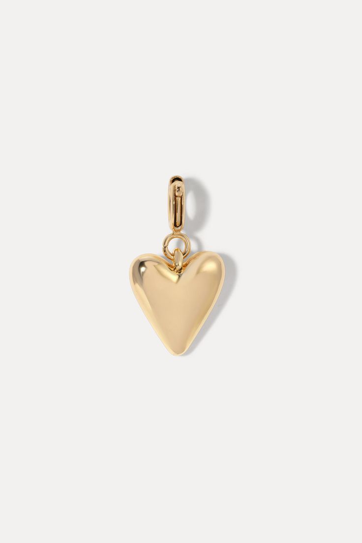 The Heart Charm is the perfect addition to your Hailey Bracelet. Its timeless design adds a touch of love and elegance, making your bracelet even more special. 18k gold-plated brass​ 11mm height, 10mm width Clip Bail​ Pairs with the Hailey Bracelet Build Your Charm Bracelet Here Elegant 14k Gold Heart Charm, Huggie Heart Charm Jewelry For Wedding, Yellow Gold Heart Charm Jewelry For Everyday, Gold Open Heart Charms Jewelry, Gold Open Heart Charm Jewelry, Gold-tone Jewelry With Heart Charm For Everyday, Elegant Heart Charms For Mother's Day, Minimalist Gold Plated Jewelry With Heart Charm, Minimalist Gold-plated Jewelry With Heart Charm