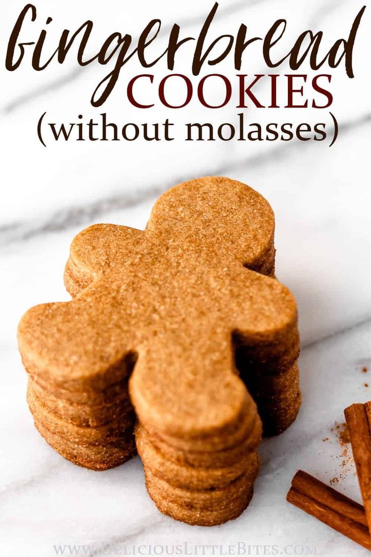 gingerbread cookies stacked on top of each other with cinnamon sticks next to them and the words gingerbread cookies without molassses