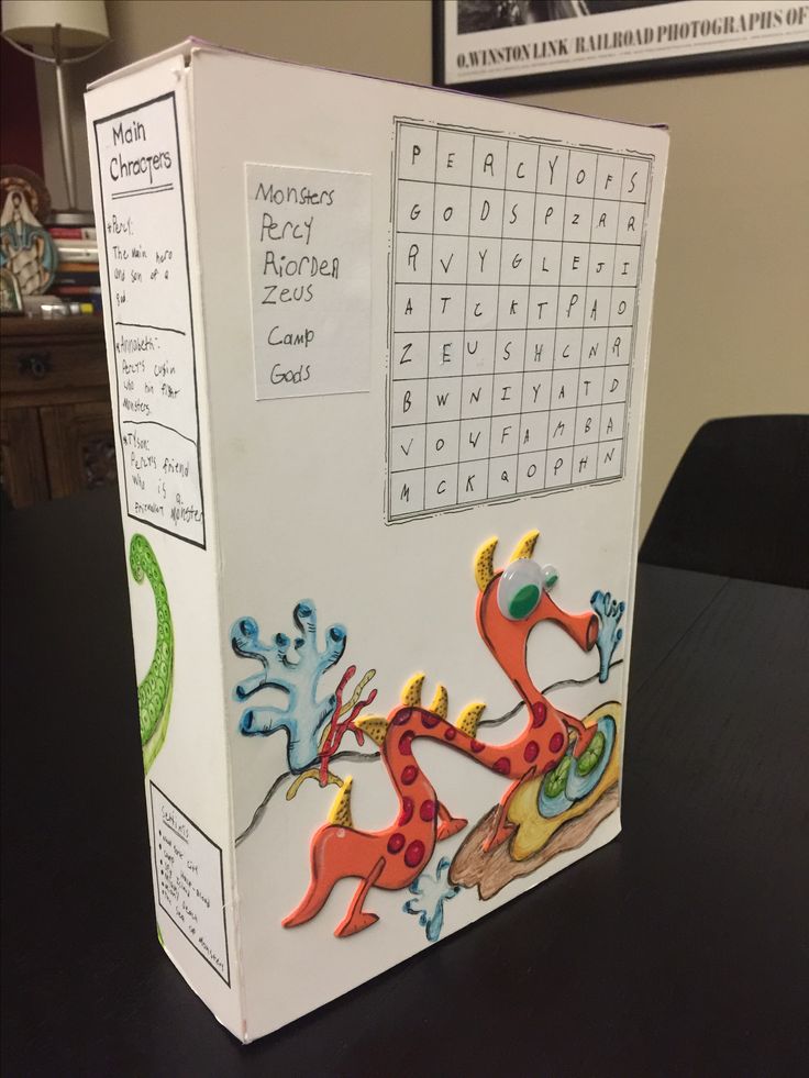 a box that is sitting on a table with some type of puzzle in the front