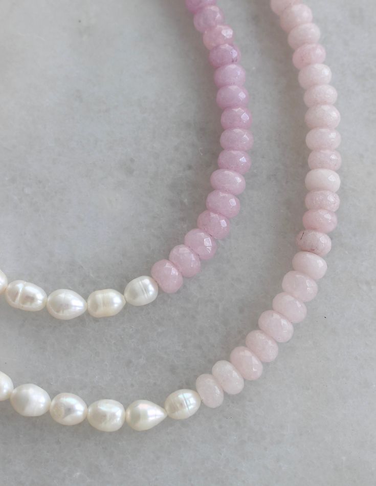 All things sweet & pearl! Choose from two gorgeous hues of pink and purple jade beads, split with real, freshwater pearls. Adjustable 15-17in. Finished off with 14K gold filled materials. Nickel and lead free. Pink Pearl Beaded Necklace With Pearl Charm, Dainty Pink Pearl Beaded Necklaces, Delicate Pink Pearl Necklace, Pink Pearl Drop Beaded Necklaces With Round Beads, Handmade Pink Pearl Necklace, Pink Pearl Beaded Necklaces With Gemstone Beads, Pink Round Beads Pearl Necklace For Gift, Pink Pearl Necklace For Gift, Pink Pearl Necklace With Gemstone Beads