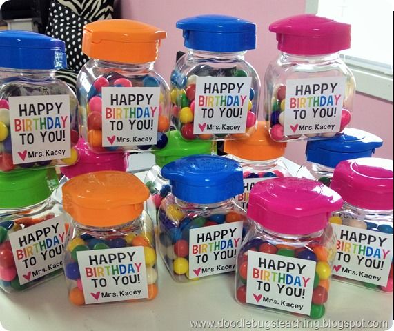 colorful candy jars with happy birthday to you labels