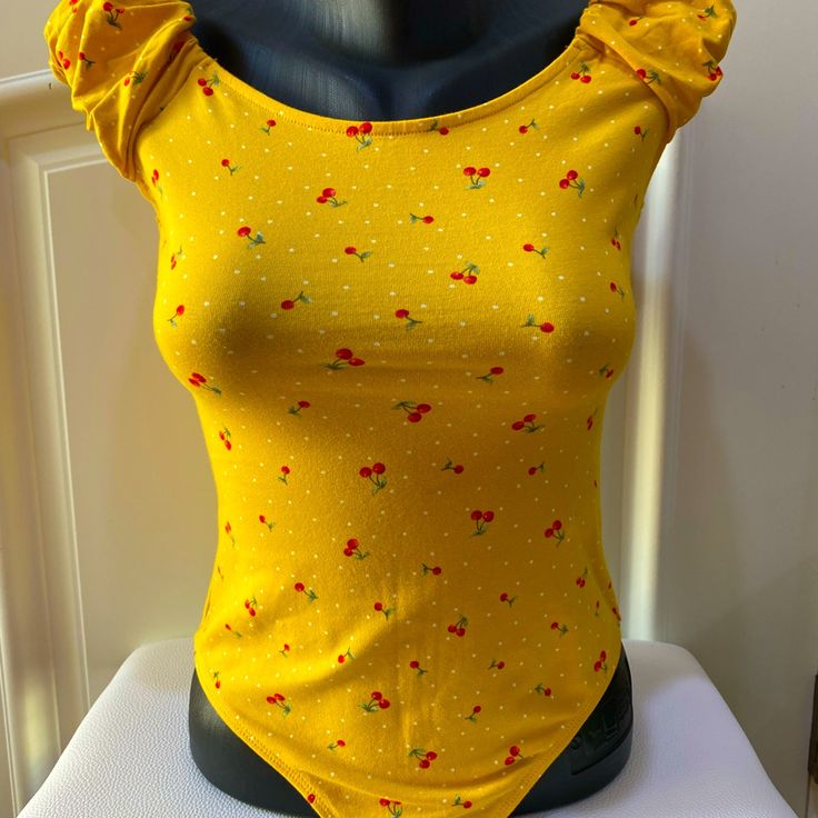 Stretch Bodysuit Beautiful Yellow Color Fits Small Medium Printed Fitted Cotton Bodysuit, Trendy Fitted Floral Print Swimwear, Trendy Fitted Floral Swimwear, Trendy Floral Print Bodysuit For Spring, Chic Cotton Bodysuit For Spring, Floral Print Fitted Bodysuit, Fitted Floral Print Bodysuit, Spring Floral Print Fitted Bodysuit, Trendy Sleeveless Printed Bodysuit