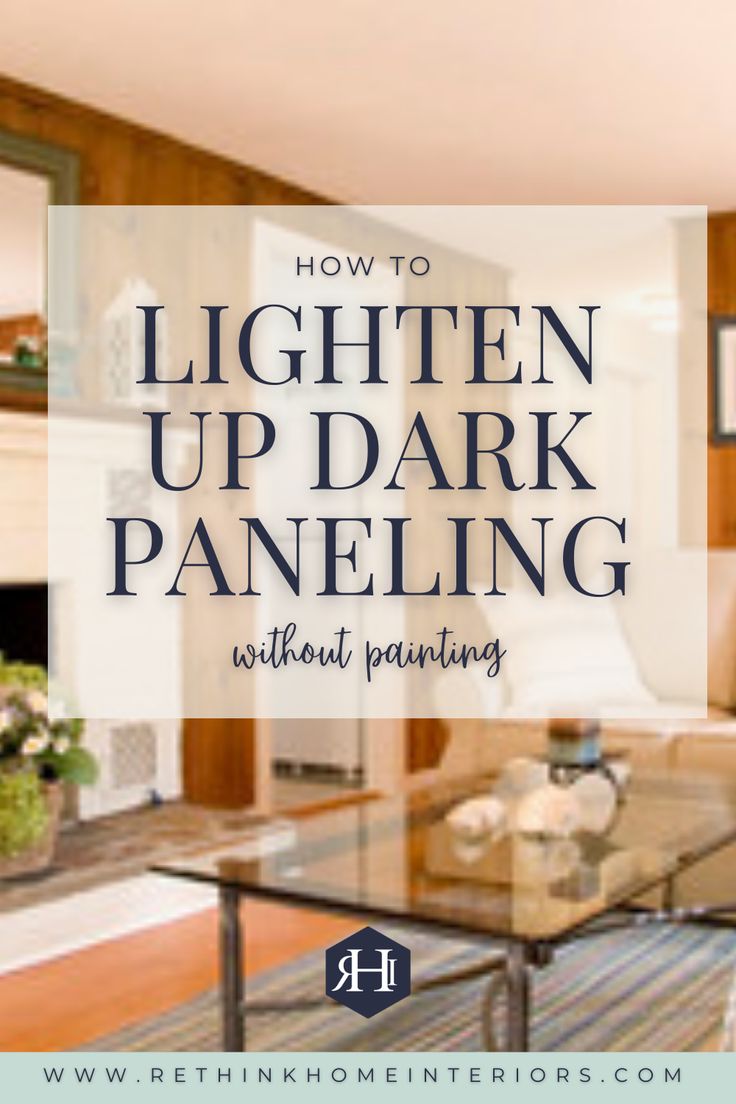 a living room filled with furniture and a fire place in the middle of it that says, how to lighten up dark paneling without painting