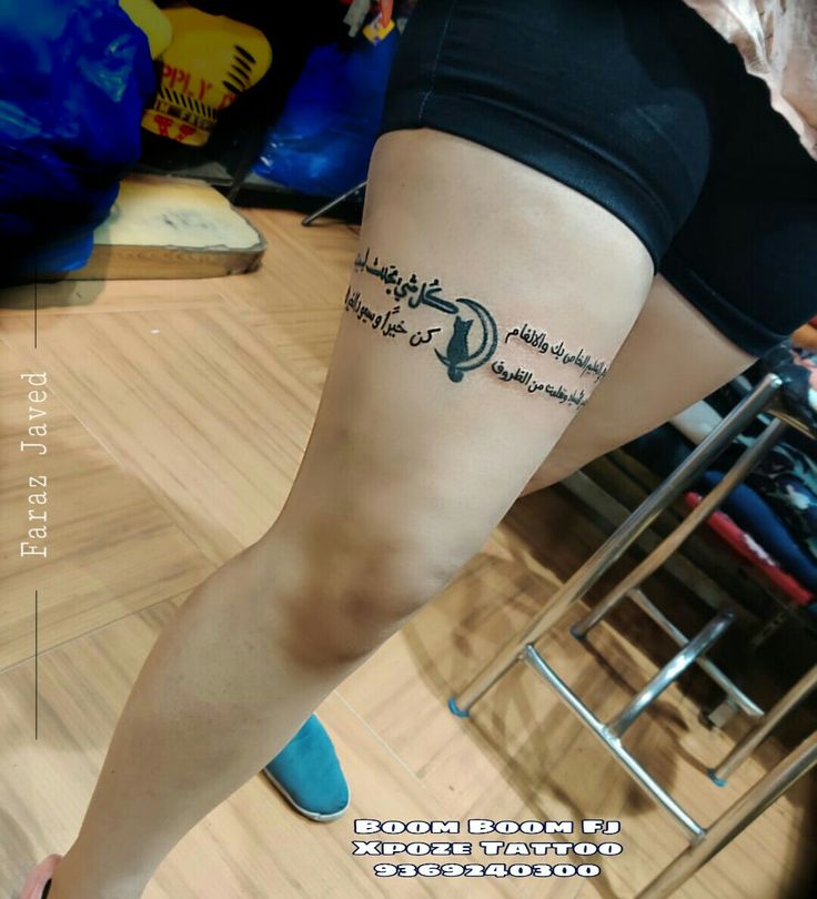 a woman with a tattoo on her leg