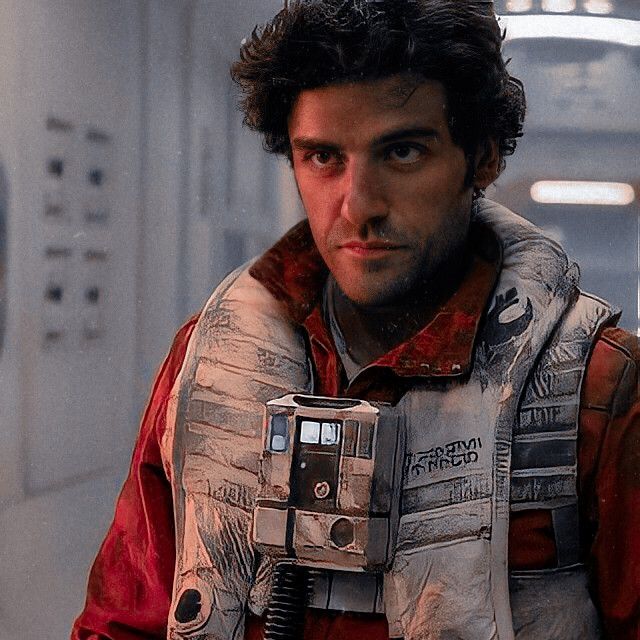 a man in a star wars costume holding a camera