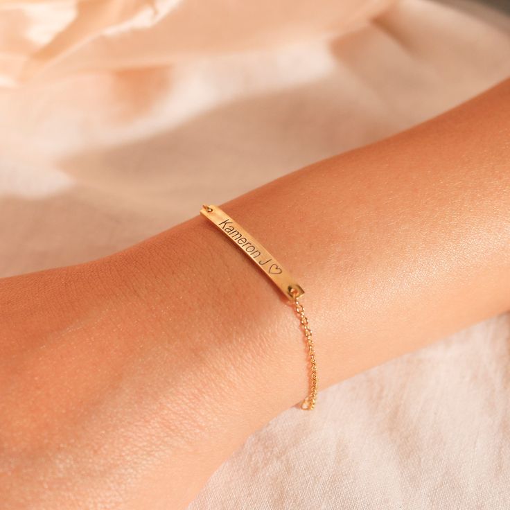 "Elevate your gifting with our 925 sterling silver gold plated personalized bracelets. Engraved with your name, initial, or a special date, they're more than just jewelry - they're a heartfelt, personalized gift for her, a constant reminder of your unique connection and thoughtfulness #YOU MAY LIKE THIS silver bar cotton bracelet https://www.etsy.com/listing/1492776594/silver-bar-cotton-bracelet-best-gift Heart Charm Bracelet https://www.etsy.com/listing/1483035072/heart-charm-bracelet-custom-en Personalized Name Bracelet For Anniversary, Meaningful Personalized Name Bracelet For Anniversary, Classic Name Bracelet For Mother's Day Gift, Personalized Name Bracelet For Gift, Personalized Name Bracelet For Gifts, Personalized Meaningful Name Bracelet Gift, Dainty Personalized Name Bracelet For Anniversary, Classic Personalized Name Bracelet As A Gift, Classic Personalized Name Bracelet As Gift