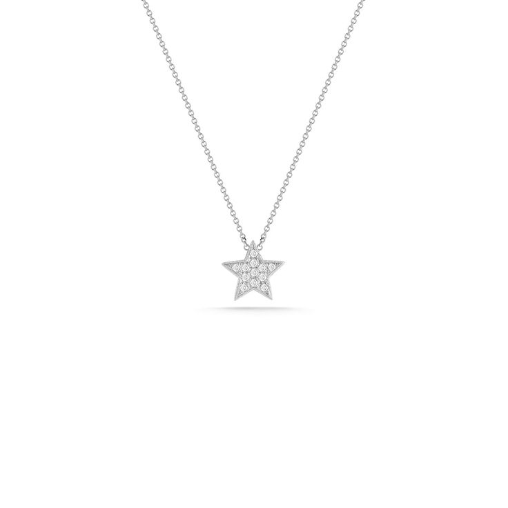 We're seeing stars! Our Julianne Himiko gold and diamond star necklace is what celestial dreams are made of. This single star pendant is adorned with pavé-set diamonds and hangs on a delicate diamond cut cable chain. Delicate and dainty, this charming necklace is perfect for layering. This is the must-have piece for all the Astrology lovers out there. It is available in 14k white, yellow, and rose gold with a spring-ring clasp and a sparkling mini-chain. The pendant is always white gold to show Fine Jewelry White Gold Necklace With Star Charm, Star Shaped Diamond Necklace With Single Cut Diamonds, Dainty Star Diamond Necklace, Dainty Diamond Star Necklace, Elegant White Gold Star Diamond Necklace, Diamond White Star Necklace With Single Cut Diamonds, White Gold Star Necklace Fine Jewelry, Diamond Star Charm Necklace, Luxury Star Necklace With Single Cut Diamonds