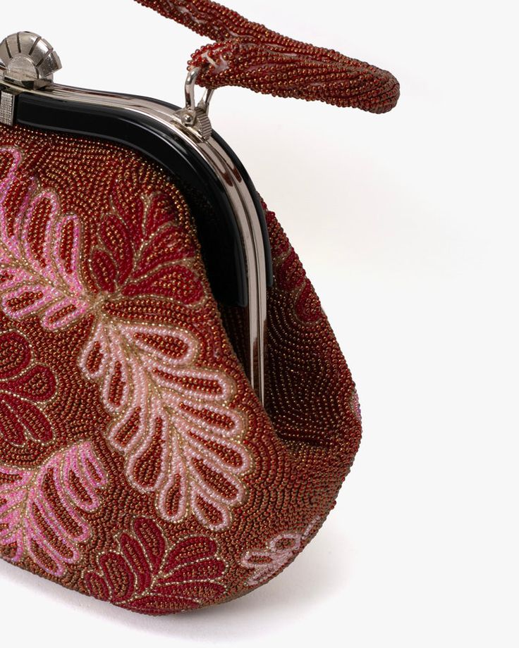 Our intricate, one of a kind vintage bags are estimated to have been produced between the 1970s–2000s. These bags are traditionally paired with kimonos as a luxurious statement piece. However, these versatile pieces may be dressed up or down with daily casual wear. Made in Japan Size: 7.5″ x 10" Product #: AC173 Code: NWS Traditional Beaded Clutch Bag, Formal Beaded Shoulder Bag With Top Handle, Luxury Embellished Red Bags, Luxury Red Embellished Bag, Formal Beaded Top Handle Shoulder Bag, Evening Top Handle Bag With Beaded Details, Red Embellished Rectangular Bag, Red Embellished Bag For Formal Occasions, Red Embellished Evening Bag