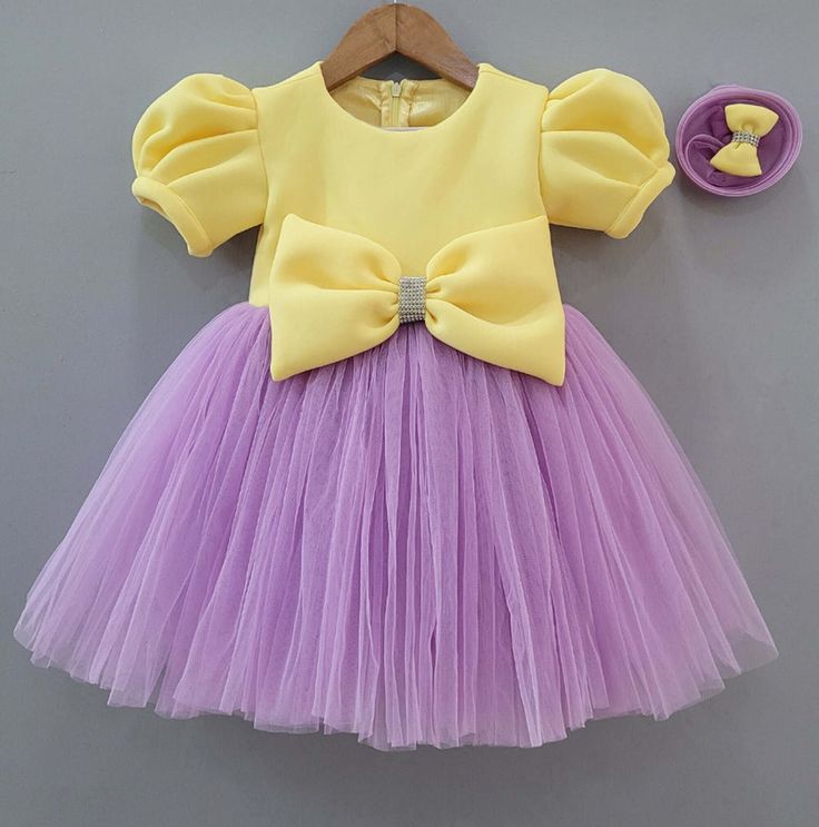 Designer wear kids frock at affordable rates.. Pure handmade Best quality guaranteed For 1 to 6 year kid Can be customised in any colour of your choice Elegant Embroidered Fitted Princess Dress, Summer Princess Dress With Embroidery, Elegant Purple Princess Dress For Spring, Fitted Lavender Tulle Princess Dress, Summer Embroidered Princess Dress, Spring Wedding Purple Tutu Dress, Purple Princess Dress For Spring, Lavender Fitted Princess Dress For Dress-up, Elegant Yellow Princess Dress For Dress-up