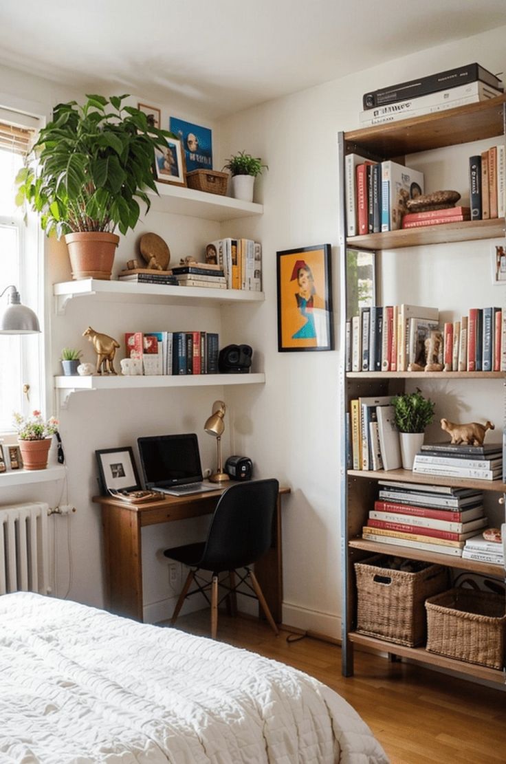 a bed room with a neatly made bed and bookshelves