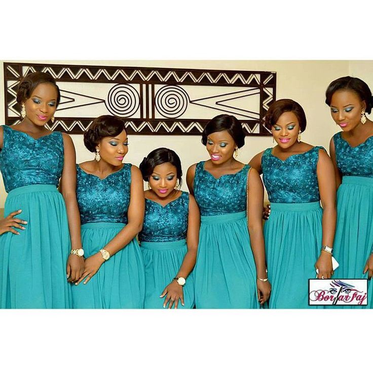 the bridesmaids are posing in their blue dresses