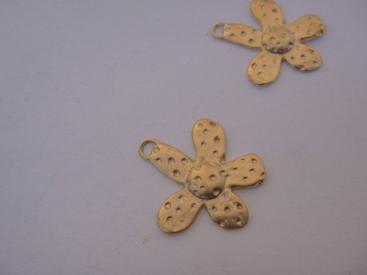 This vermeil polka dot daisy charm is a nice piece for necklaces, bracelets and earrings. It measures about 15x15mm. It is 18k gold plated over 925 sterling silver (vermeil), matte finished. 1 pc. For the larger quantity convo us. Thanks for stopping by! Handmade Dainty Gold Charms, Dainty Handmade Gold Charms, Elegant Handmade Gold Charms, Gold Flower Shaped Nickel Free Necklace, Handmade Gold Metal Charms, Gold Flower Pendant Charms As Gift, Gold Flower Charm For Gift, Gold Pendant Charm With Flower Detail, Gold Flower Pendant Charms For Gifts