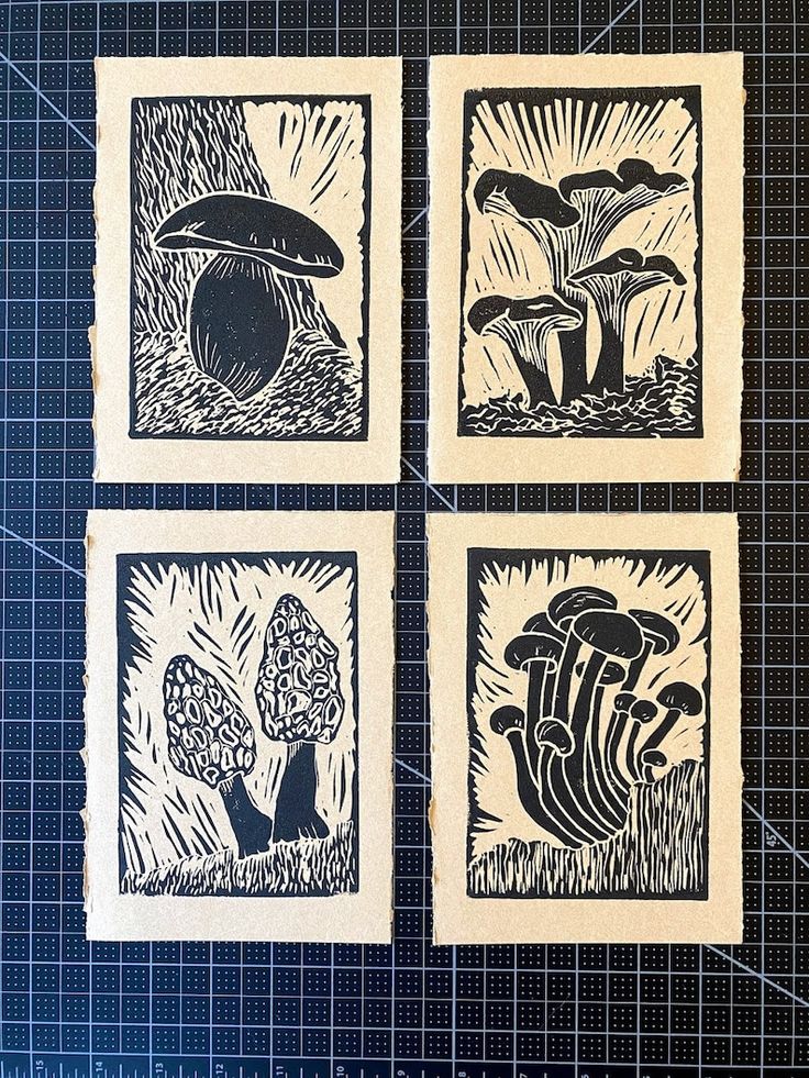 four black and white prints with mushrooms on them