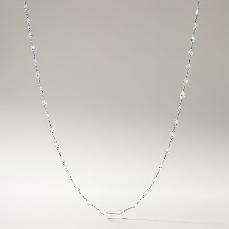 Crafted in 2.18 grams of 18K White Gold, the necklace contains 47 stone of Pear Shaped Rose Cut Natural Diamond with a total of 3.51 carat in E-F color and VVS-VS clarity. The necklace length is 18 inches. Elegant White Gold Chain Necklace For Everyday Luxury, Elegant Everyday White Gold Chain Necklace, Elegant Everyday Luxury White Gold Chain Necklace, Delicate White Diamond Necklace With Delicate Chain, White Diamond Necklace With Delicate Chain, Luxury White Necklace With Delicate Chain, White Luxury Necklace With Delicate Chain, Luxury White Clavicle Chain Necklace, White Cable Chain Necklace For Formal Occasions