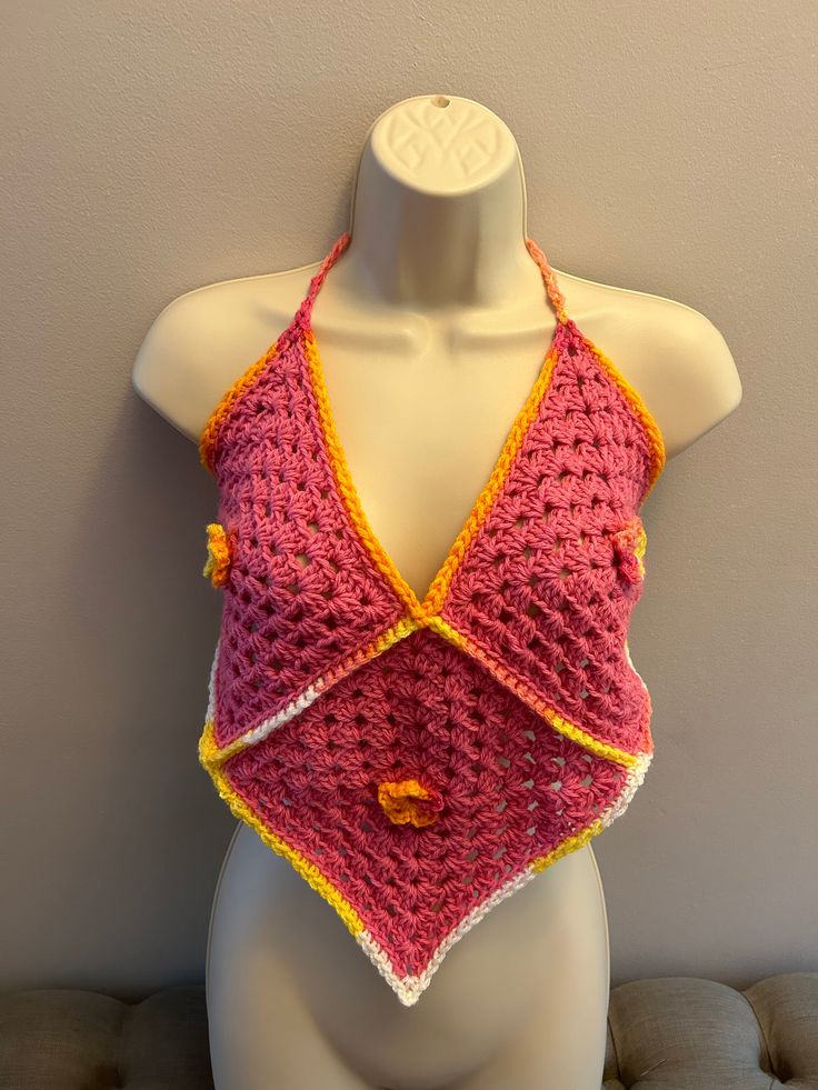 Crocheted bohemian top. One size fits most Spring Festival V-neck Halter Top, Bohemian V-neck Halter Top For Summer, Summer Festival V-neck Halter Top, Fitted V-neck Top For Festival, Bohemian V-neck Crop Top For Beach Season, Festival Crochet V-neck Crop Top, Bohemian Cotton Crochet V-neck Top, Casual Festival Tops With Crochet Trim, Fitted Tops With Crochet Trim For Spring