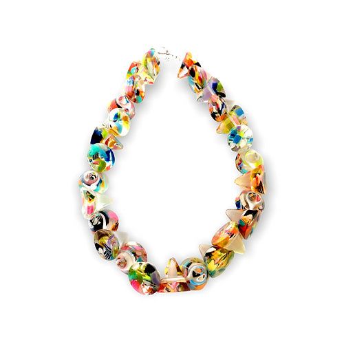 Cone-shaped beaded necklace with colorful confetti design Made from clear and colored resin Note: Each piece is handmade and one-of-a-kind. Patterns and coloring will vary Free shipping! Designed in South Florida and made in Brazil. Unique Multicolor Murano Glass Necklaces, Multicolor Murano Glass Jewelry With Large Beads, Whimsical Multicolor Jewelry With Large Beads, Handmade Multicolor Murano Glass Necklaces, Handmade Rainbow Resin Jewelry, Handmade Multicolor Murano Glass Necklace, Handmade Colorful Glass Jewelry, Handmade Murano Glass Multicolor Necklaces, Whimsical Multicolor Handmade Necklaces