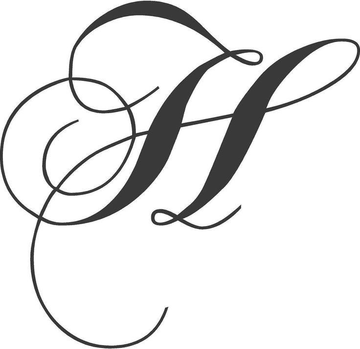 the letter w is made up of swirls and scrolls, with an elegant design