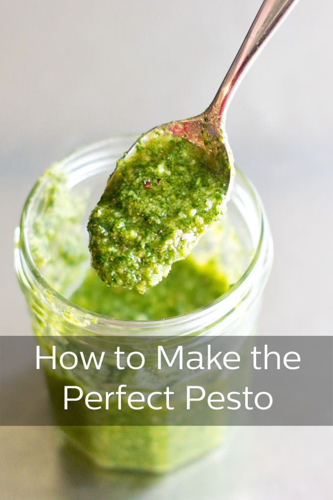 a spoon full of pesto on top of a glass jar with the words how to make the perfect pesto