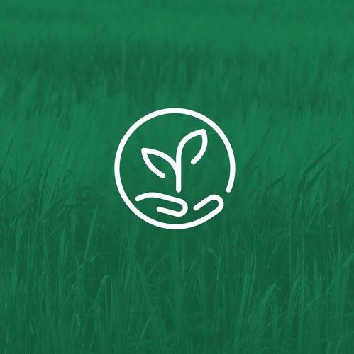 a green field with a white logo on it