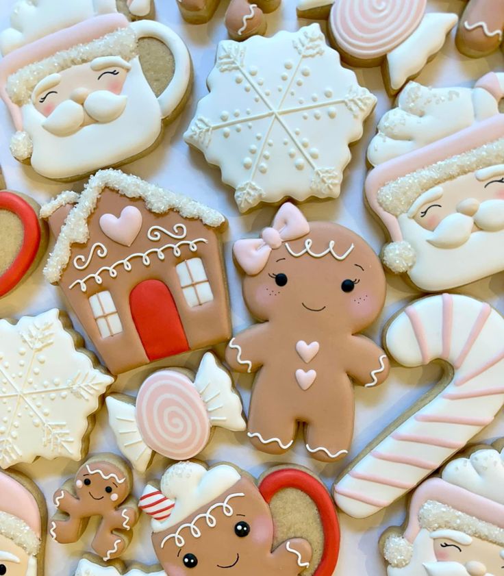 gingerbread cookies decorated like santa claus and other holiday treats