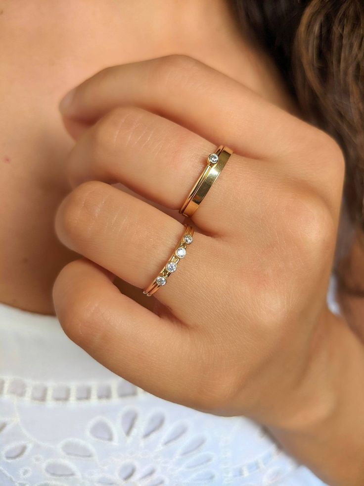 "\"Lillian\" ♀ 14/20 gold filled CZ wire ring ♀ 2mm 3A quality CZ ♀ Band Width: 1mm ♀ Flat Band Width: 2.25mm ♀ Nickel Free \"Being happy never goes out of style.\" -Lillian Pulitzer Rousseau" Everyday Yellow Gold Stackable Rings With Vs Clarity, Dainty Stackable Rings With Si Clarity, Gold Dainty Crystal Ring With Single Diamond, Delicate 14k Gold Filled Midi Rings For Anniversary, Elegant Stackable 14k Gold-filled Promise Rings, Minimalist Gold Diamond Stackable Rings, Minimalist Diamond Stackable Gold Rings, Minimalist Diamond Stackable Rings In Gold, Dainty Everyday Crystal Ring With Diamond