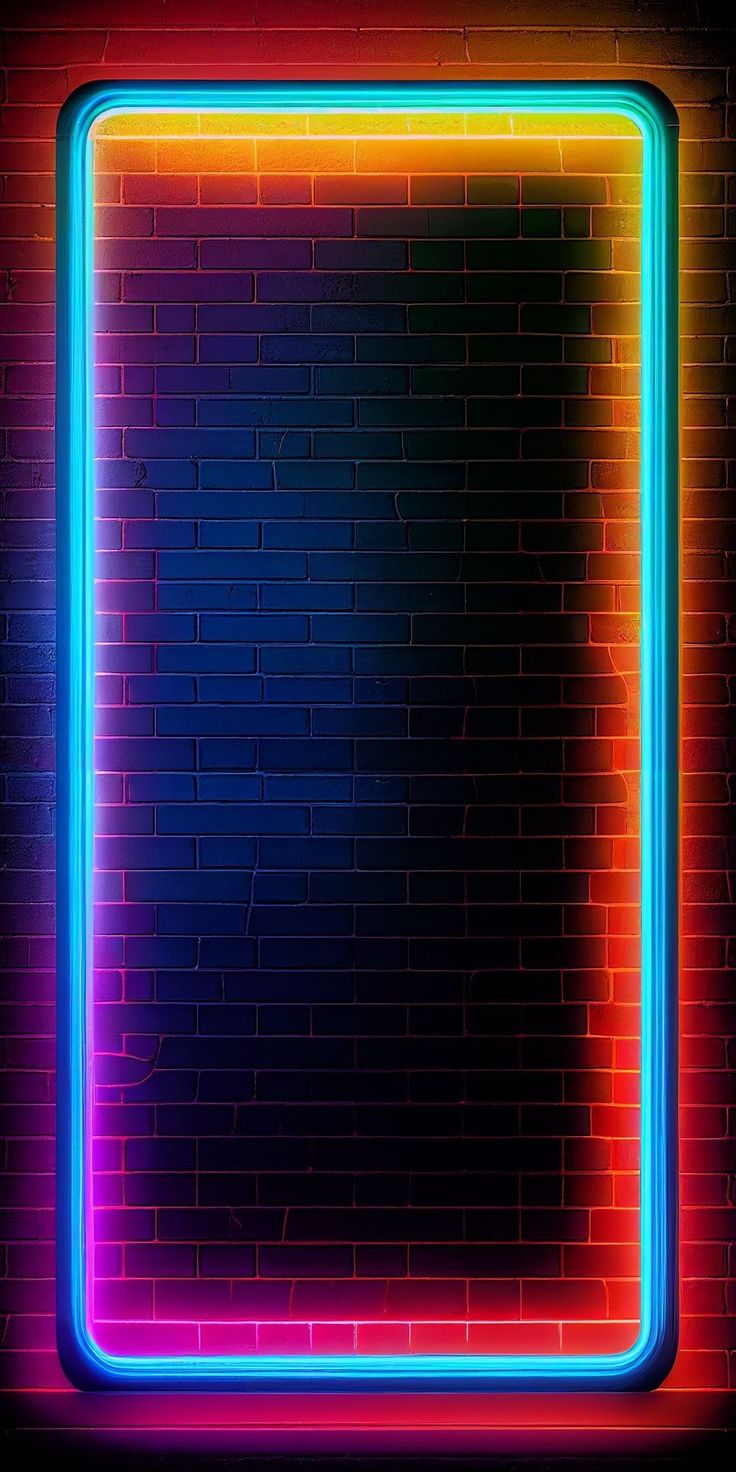 a square neon frame on a brick wall