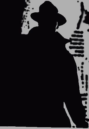 the silhouette of a man with a hat and cane