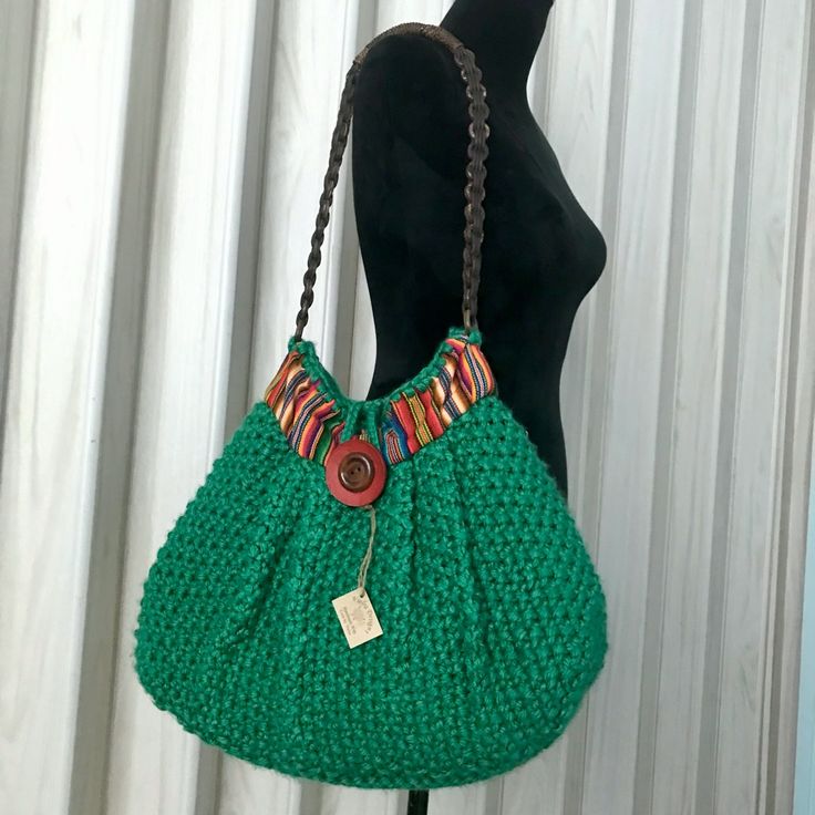 Hand Knit Hobo Bag,Lining And Pocket Inside,Exotic Coconut/ Leather Handles. Chic Knitted Bags For Everyday Use, Chic Crochet Bag Handmade For Everyday Use, Chic Everyday Crochet Bag Hand Knitted, Hand Knitted Shoulder Bag, Chic Handmade Crochet Bag For Everyday Use, Hand Knitted Shoulder Bag For Everyday Use, Green Shoulder Bag With Leather Handles For Market, Green Knitted Shoulder Bag For Daily Use, Knit Crochet Tote Bag For Shopping