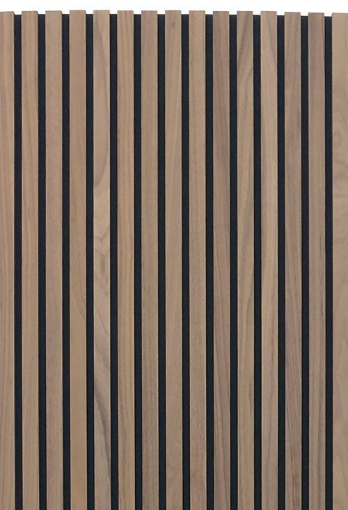 a wooden panel with black and white stripes on the bottom, in an angled pattern