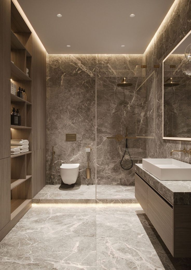 a modern bathroom with marble walls and flooring