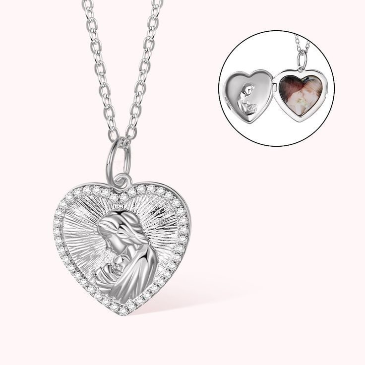 [Customizable Locket Design]:Our locket necklace is a heartfelt gift that allows you to cherish precious memories. The locket features a beautiful design, with a mother embracing her child, symbolizing the unconditional love between a mother and her child. The locket can be customized with a photo of your choice, creating a unique and sentimental keepsake. [Adorned With Zircon]:The locket is adorned with sparkling zircon stones, adding an elegant and eye-catching feeling. The zircons beautifully Valentine's Day White Gold Necklaces With Charms, Silver Locket Jewelry For Birthday Gift, Valentine's Day White Gold Charms Necklace, White Gold Necklaces For Birthday And Valentine's Day, Mother's Day Heart Necklace With Charms, Heart Pendant Locket Necklace Gift, Silver Heart Charm Necklace For Birthday Gift, Silver Necklace With Heart Charm For Birthday, Mother's Day Gift Heart Necklace With Charms