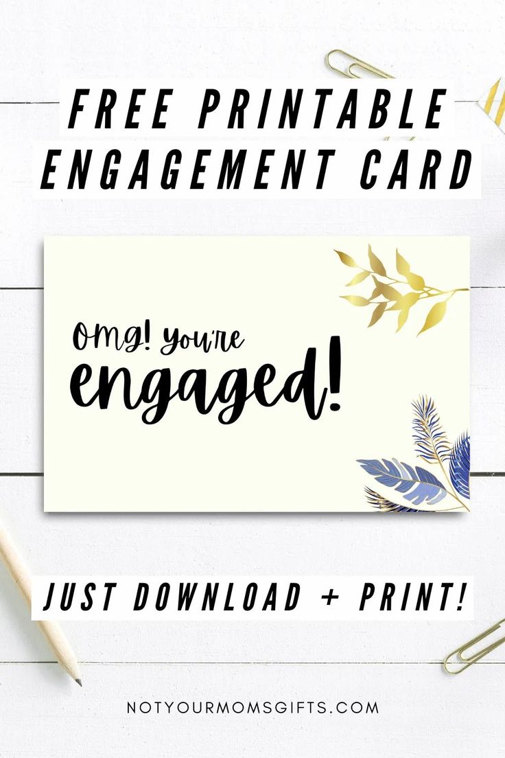 the free printable engagement card is displayed on a table with scissors and paper clips