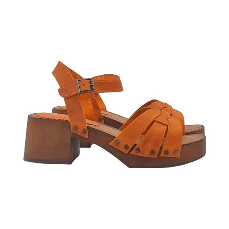 Add a pop of vibrant color to your look with these orange genuine leather sandals Clogs with brown wood effect base Leather upper Soft leather insole Adjustable ankle strap Heel height 6 cm with 3 cm platform Handmade product in Italy The craftsmanship and use of the best materials translate into a very high quality product, perfect for enhancing your elegance on every occasion. BEFORE MAKING THE PURCHASE DO NOT FORGET TO CHECK THE SIZE! --- This handmade item is made and designed entirely by the craftsman Gennaro Duello, founder of Kiara Shoes, Gioie Italiane and My Clogs. Orange Leather Sandals With Heel Loop, Orange Sandals With Heel Strap And Block Heel, Orange Sandals With Heel Strap And Open Heel, Orange Sandals With Heel Strap, Orange Platform Sandals With Ankle Strap, Orange Leather Sandals For Summer, Orange Leather Heels With Heel Loop, Orange Sandals With Ankle And Heel Straps, Orange Sandals With Ankle Strap And Heel Strap