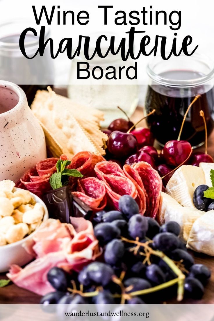 wine tasting charcuterie board with grapes and cheese