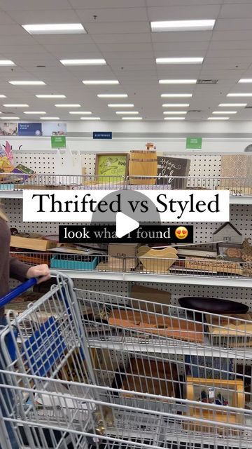 a woman pushing a shopping cart through a store