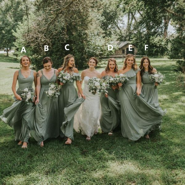 a group of women standing next to each other on top of a lush green field