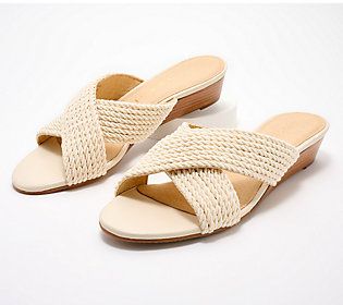 This chic slide features comfortable criss-cross straps and a stacked wedge heel that gives the perfect little lift to your daily ensembles. From Jack Rogers. Wedge Heel Slides For Summer Vacation, Summer Vacation Wedge Heel Slides, Summer Vacation Slides With Wedge Heel, Chic Slide Wedge Sandals For Vacation, Chic Slide Wedge Sandals For Beach, Chic Beach Slide Wedge Sandals, Wedge Heel Slides For Spring Vacation, White Slide Wedge Sandals For Spring, Chic Beach Slides With Wedge Heel