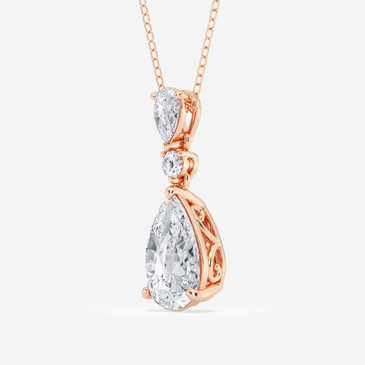 A celebration of smooth curves and sharp edges, this hinged pear shape diamond pendant radiates with effortless elegance. A solitaire lab grown pear shaped diamond creates a beautiful reflection against a smaller pear shaped and round diamond, promoting the elongating effect of this refined shape. Style this pendant on its own for a subtle sparkle or make it the most beautiful part of your layered look. Pear Jewelry, Fashion Pendant, Pearl And Diamond Earrings, Ethical Jewelry, Pear Diamond, Pear Shaped Diamond, Pearl Diamond, Effortless Elegance, Metal Necklaces