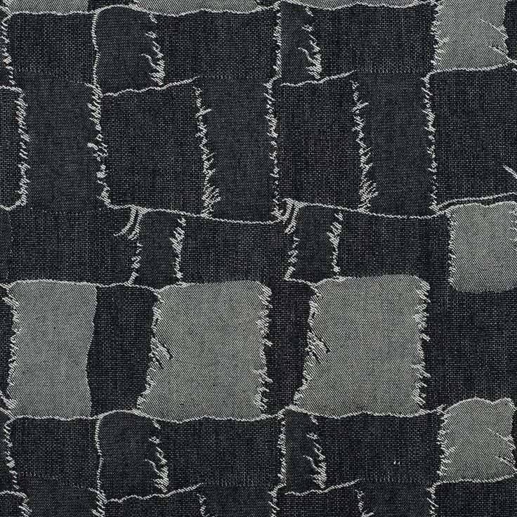 black and white fabric with small squares on it